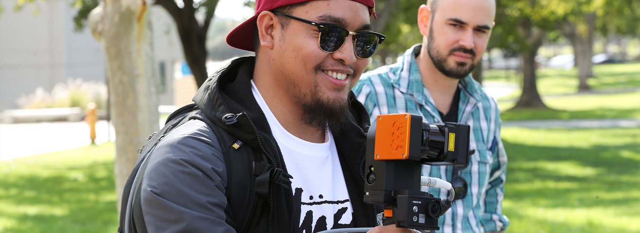 Geological Studies Student Using LIDAR (Light Detection and Ranging) mapping technology