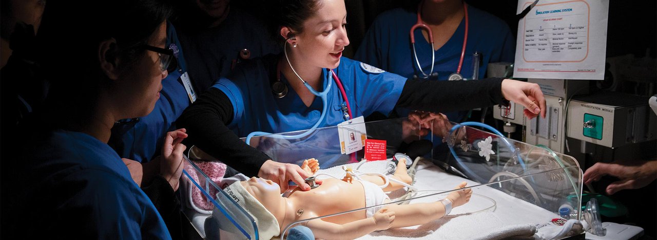 Nursing students working in classroom lab