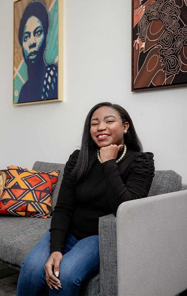 Girl smiles in the Pan-African Student Success Center