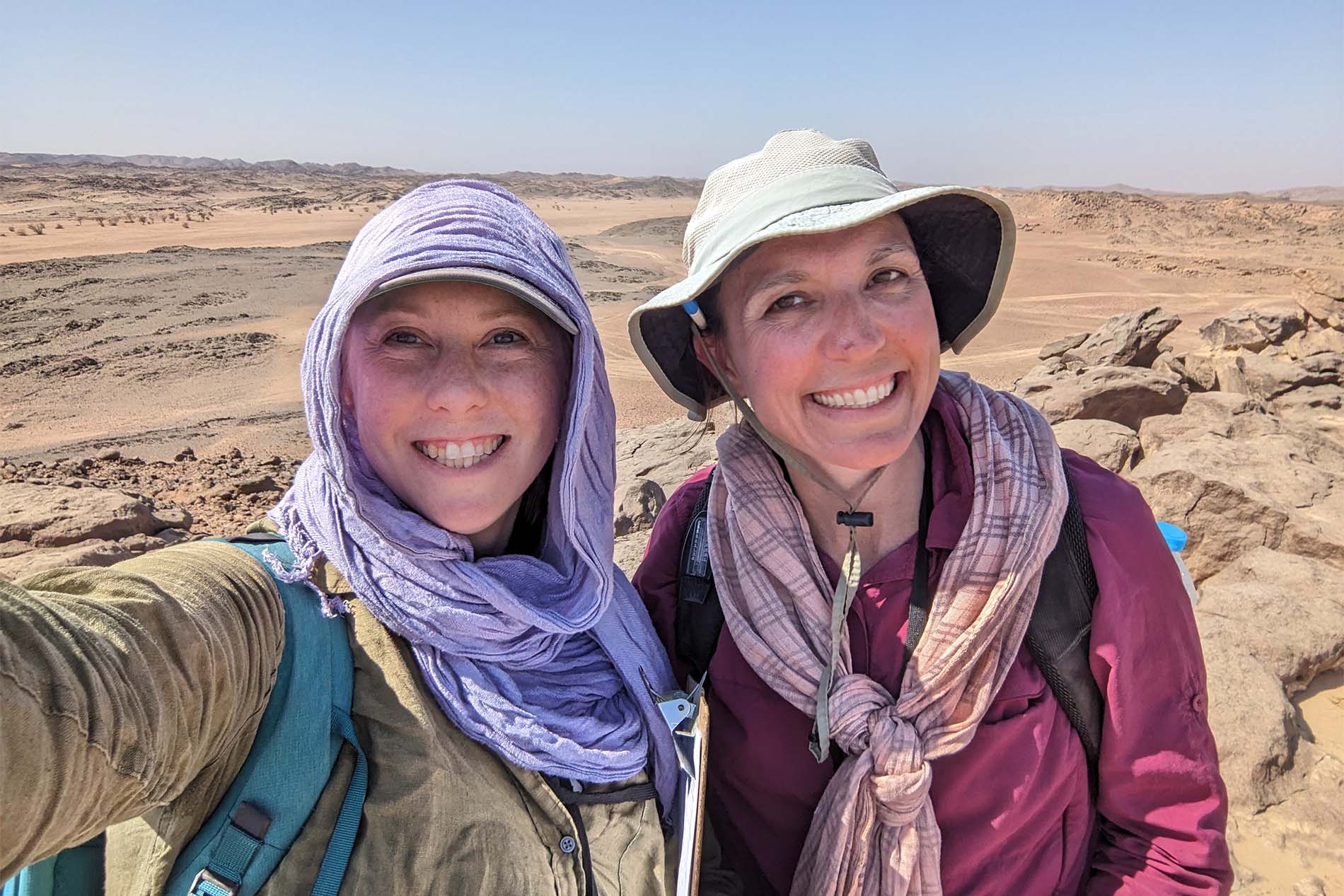 Kate Liszka smiling with colleague in Egypt.