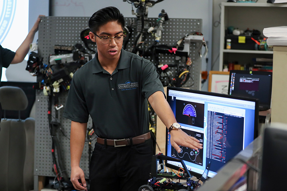 Student working in cybersecurity classroom