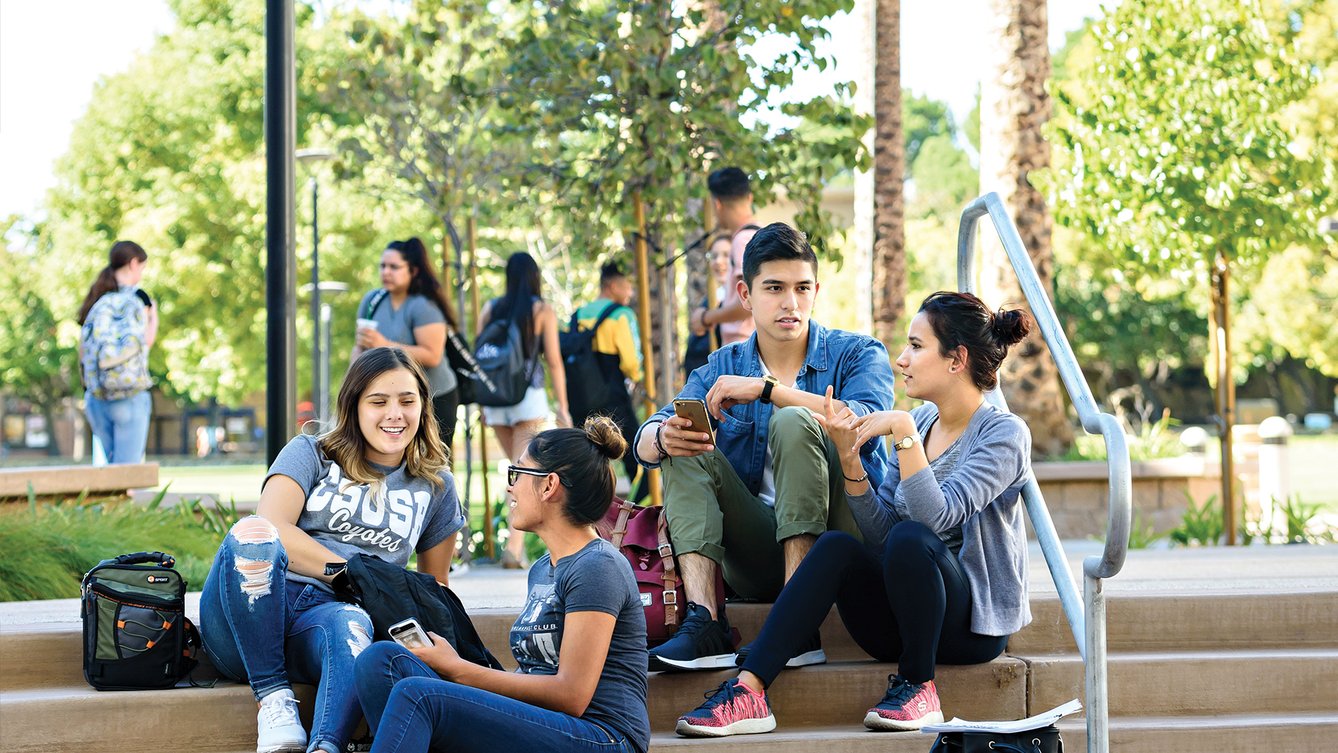 CSUSB students converse on steps